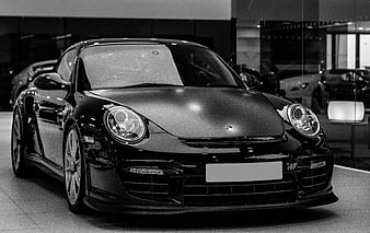 Black and White Porsche 911 GT2 RS in Showroom