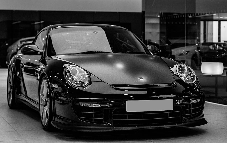 Black and White Porsche 911 GT2 RS in Showroom