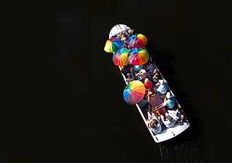 Aerial View of Tourist Boat with Colorful Umbrellas