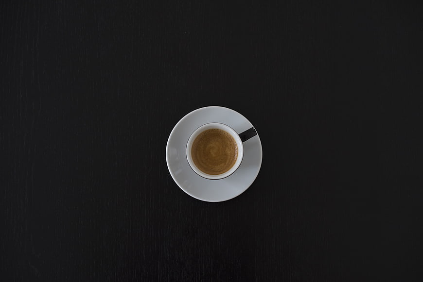 Top View of Espresso Cup on Black Table