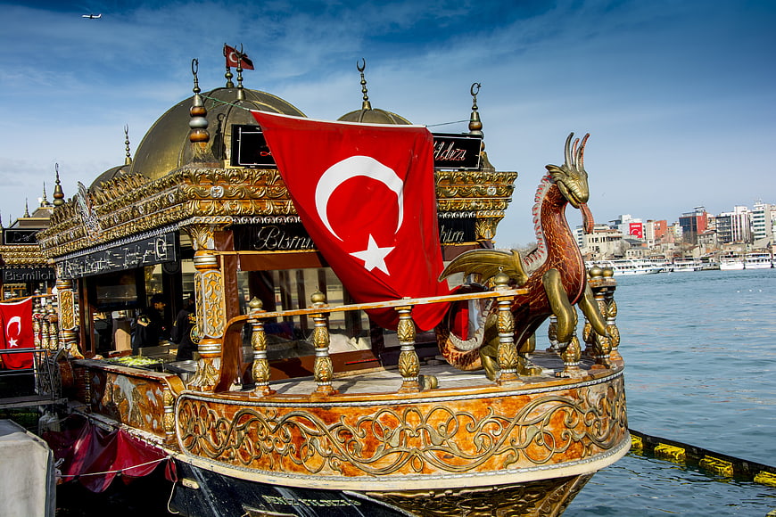Ornate Turkish Traditional Boat with Dragon Figurehead on Bosphorus