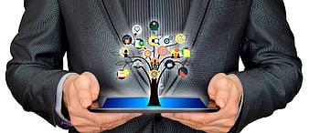 Businessman Holding Tablet With Digital Business Strategy Tree Concept