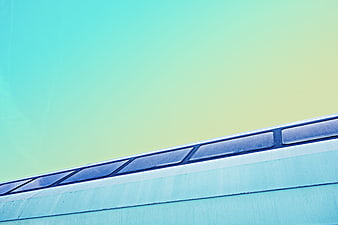Abstract architectural detail with cyan and yellow gradient background