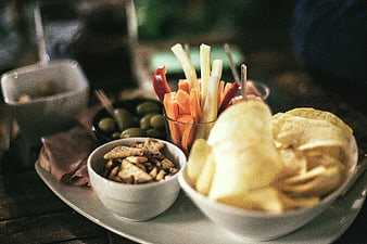 Assorted Snack Platter with Chips, Veggies, and Olives