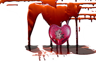 Broken Heart With Red Liquid Splash On White Background
