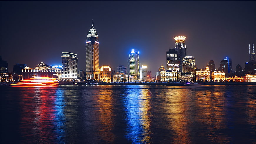 Shanghai Bund Skyline at Night with Water Reflections