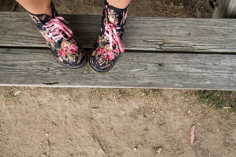 Floral Pattern Boots on Wooden Bench