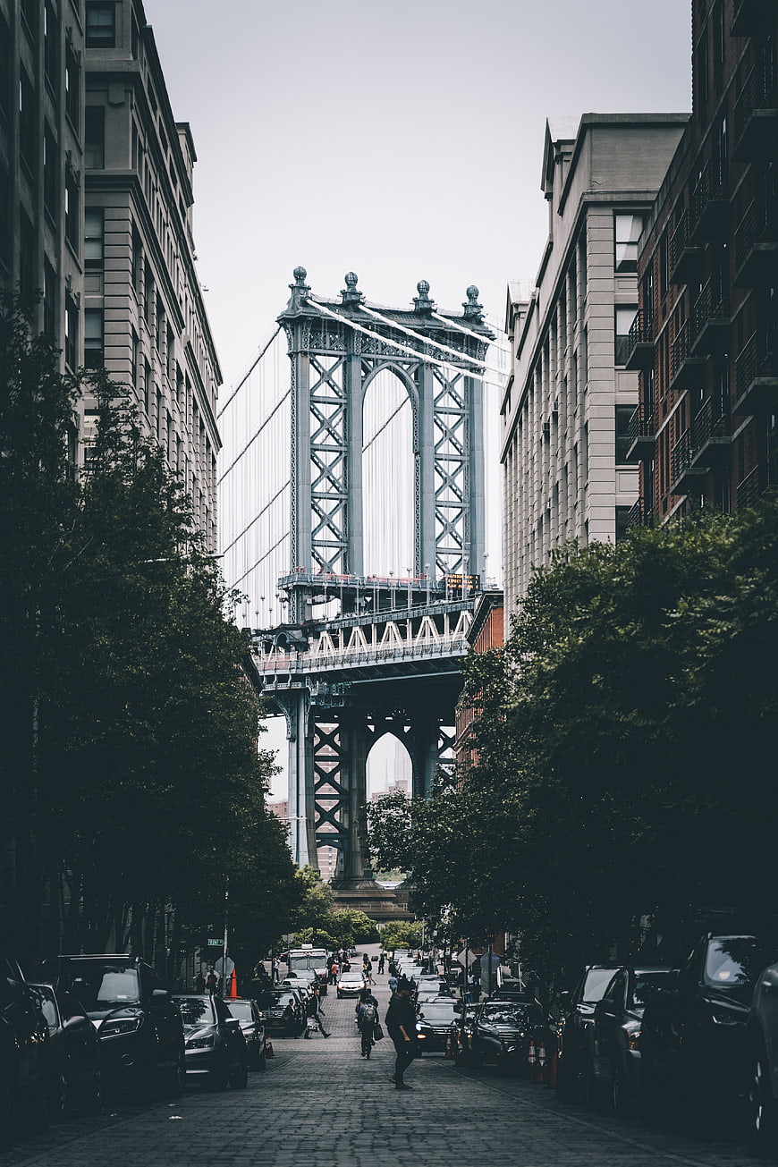 Manhattan Bridge View Between City Buildings