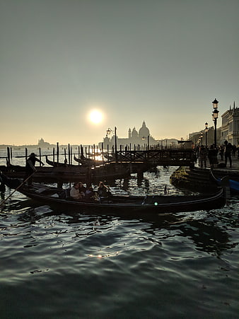 Gondola Ride in Venice at Sunset with Basilica Silhouette