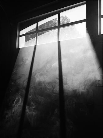 Dramatic Black and White Smoke Beams Through Window