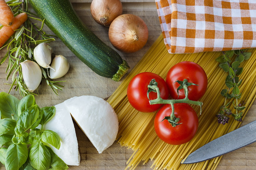 Fresh Italian Pasta Ingredients on Wooden Board