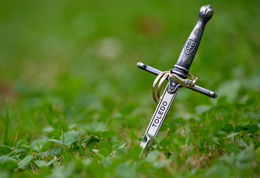 Miniature Sword with Wedding Rings in Green Grass