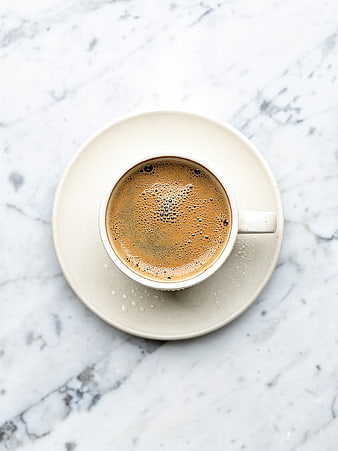 Top View of Fresh Espresso Coffee on Marble Surface