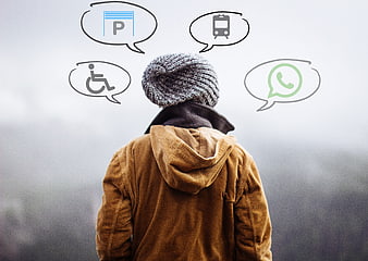 Person with thought bubbles containing accessibility and transit icons