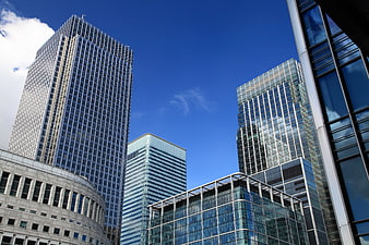 Modern Glass Skyscrapers Against Blue Sky