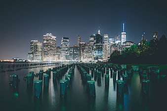 New York City Skyline at Night with Water Reflections