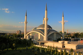 Modern Mosque with Minarets and Blue Sky