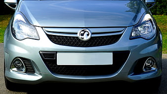 Front view of silver Vauxhall Corsa car