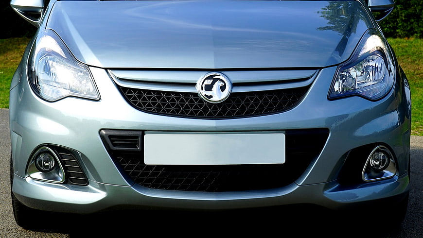 Front view of silver Vauxhall Corsa car