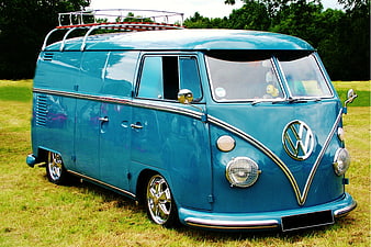 Classic Blue Volkswagen Camper Van Parked On Grass