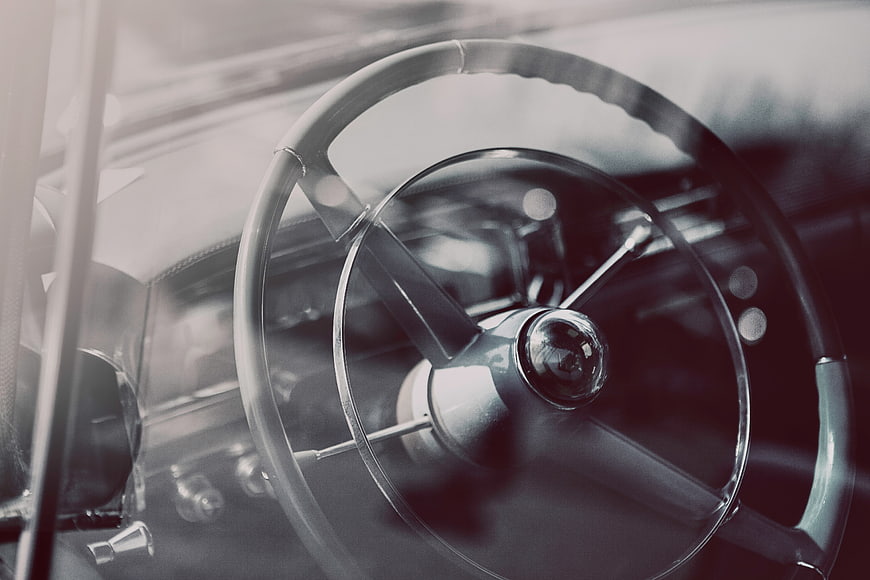 Vintage Car Interior Detail With Retro Steering Wheel