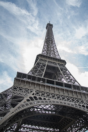 Low Angle View of Eiffel Tower Against Blue Sky