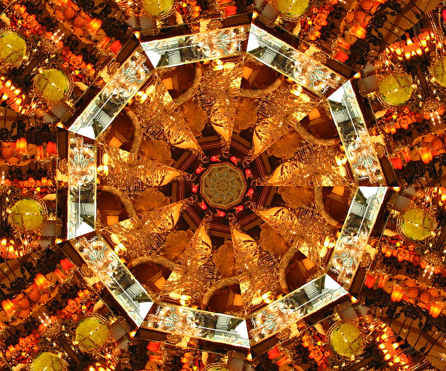 Golden kaleidoscope pattern with lanterns and mirrors