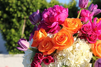 Vibrant Spring Bouquet of Orange Roses, Pink Peonies, and Tulips