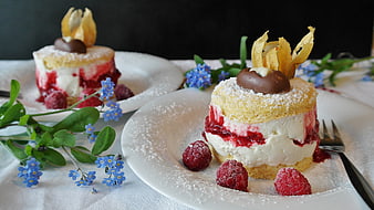 Raspberry and Cream Layered Cake with Chocolate and Blue Flowers