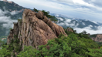 Seoraksan Mountain Rock Formation With Sea Of Clouds And Distant City View