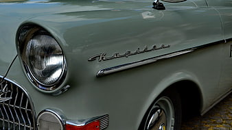Close-up of vintage Kapitan car front fender and headlight