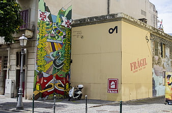 Street Art Mural and Yellow Container in Funchal, Madeira