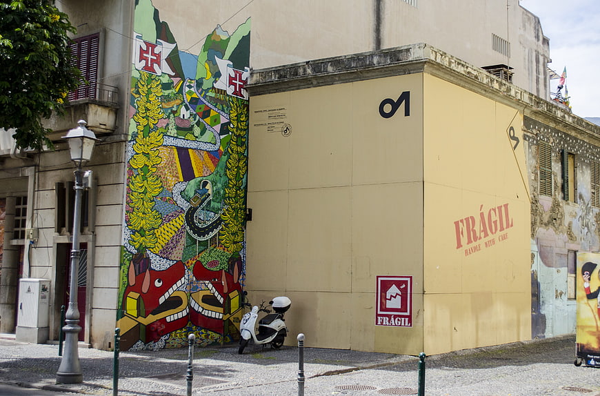 Street Art Mural and Yellow Container in Funchal, Madeira