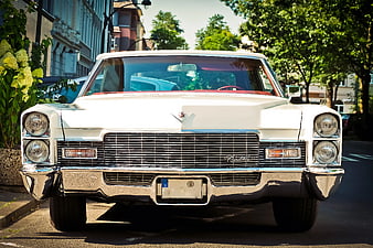 Front View of Classic White Cadillac Eldorado on Street