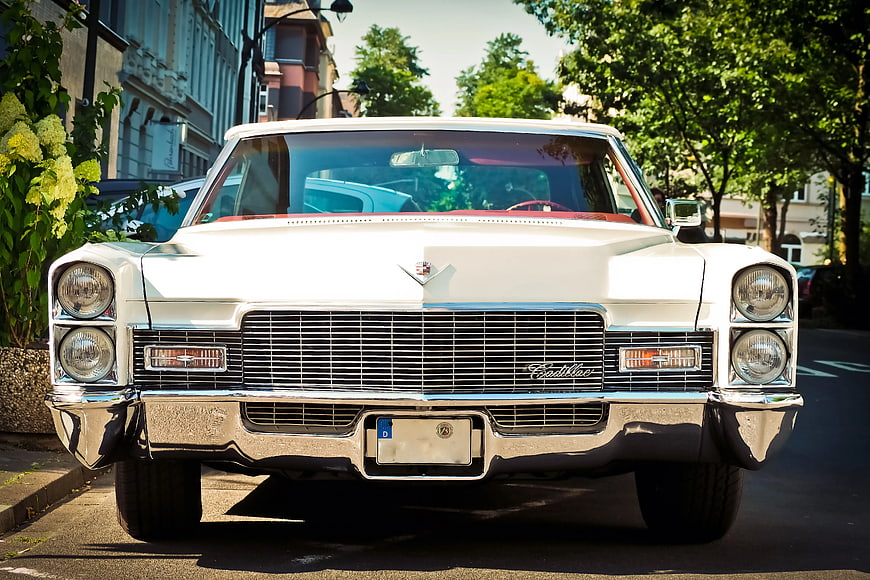 Front View of Classic White Cadillac Eldorado on Street