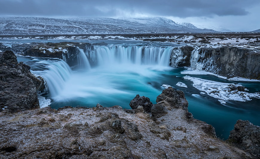 Godafoss Waterfall in Iceland with Snow and Long Exposure