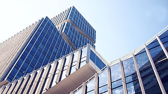 Low Angle View of Modern Glass Office Building