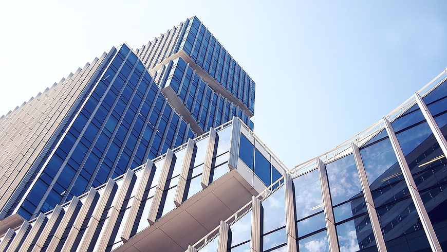 Low Angle View of Modern Glass Office Building