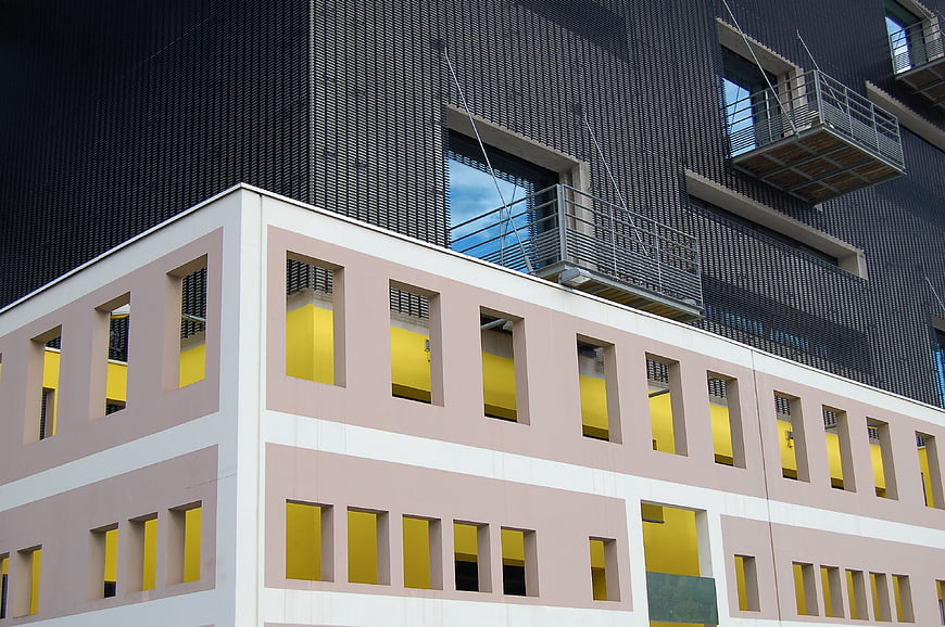 Modern Architecture with Pink Facade and Yellow Windows