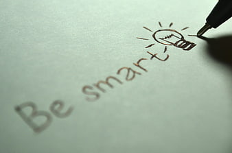 Handwriting Be Smart with Lightbulb Icon on Paper