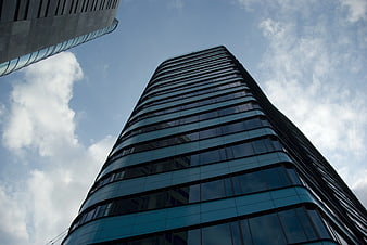 Low Angle View of Modern Glass Skyscraper