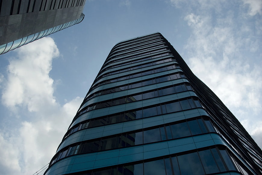 Low Angle View of Modern Glass Skyscraper