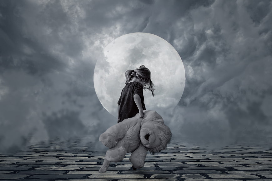 Child dragging teddy bear under giant full moon