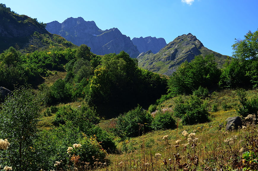 Scenic Mountain Landscape with Green Hills and Blue Sky