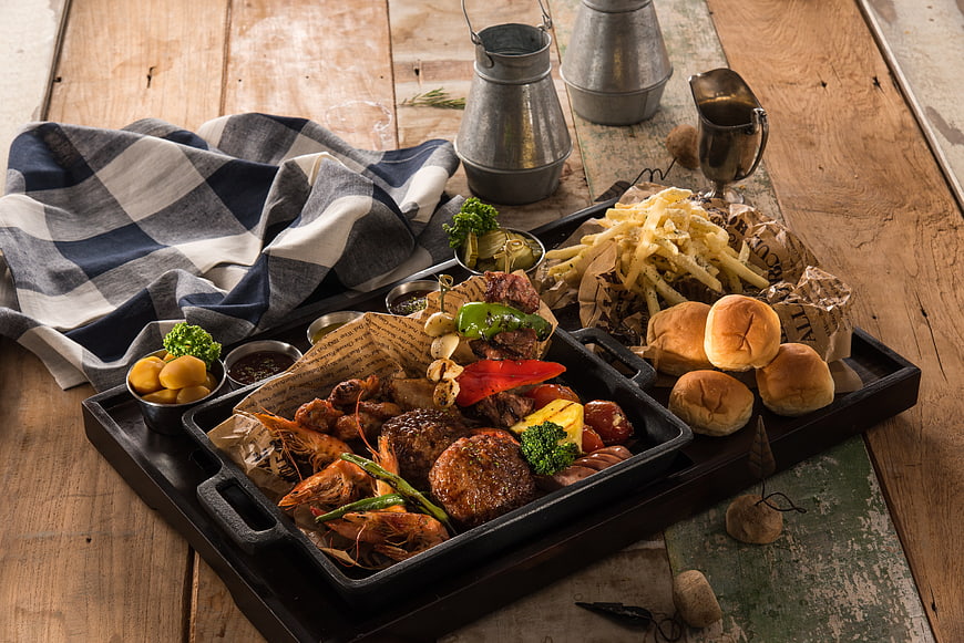 Rustic BBQ Platter with Steak, Shrimp, Fries, and Buns