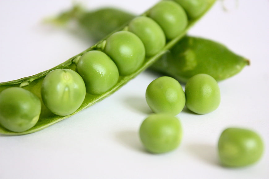 Fresh Green Peas in Pod on White Background