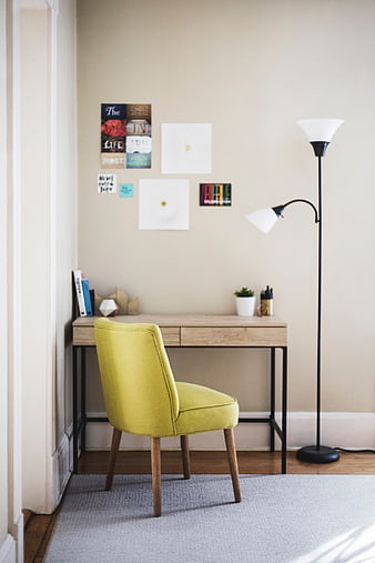 Modern Home Office Desk with Yellow Chair and Gallery Wall
