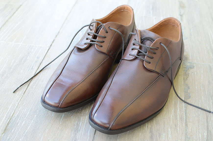 Brown Leather Oxford Shoes on Wooden Floor