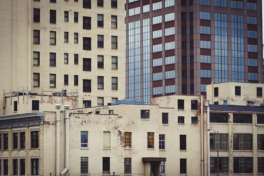 Urban Architecture Contrast: Old Brick and Modern Glass Buildings