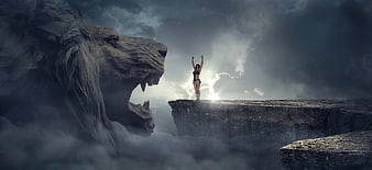 Woman standing on cliff edge facing giant stone lion head